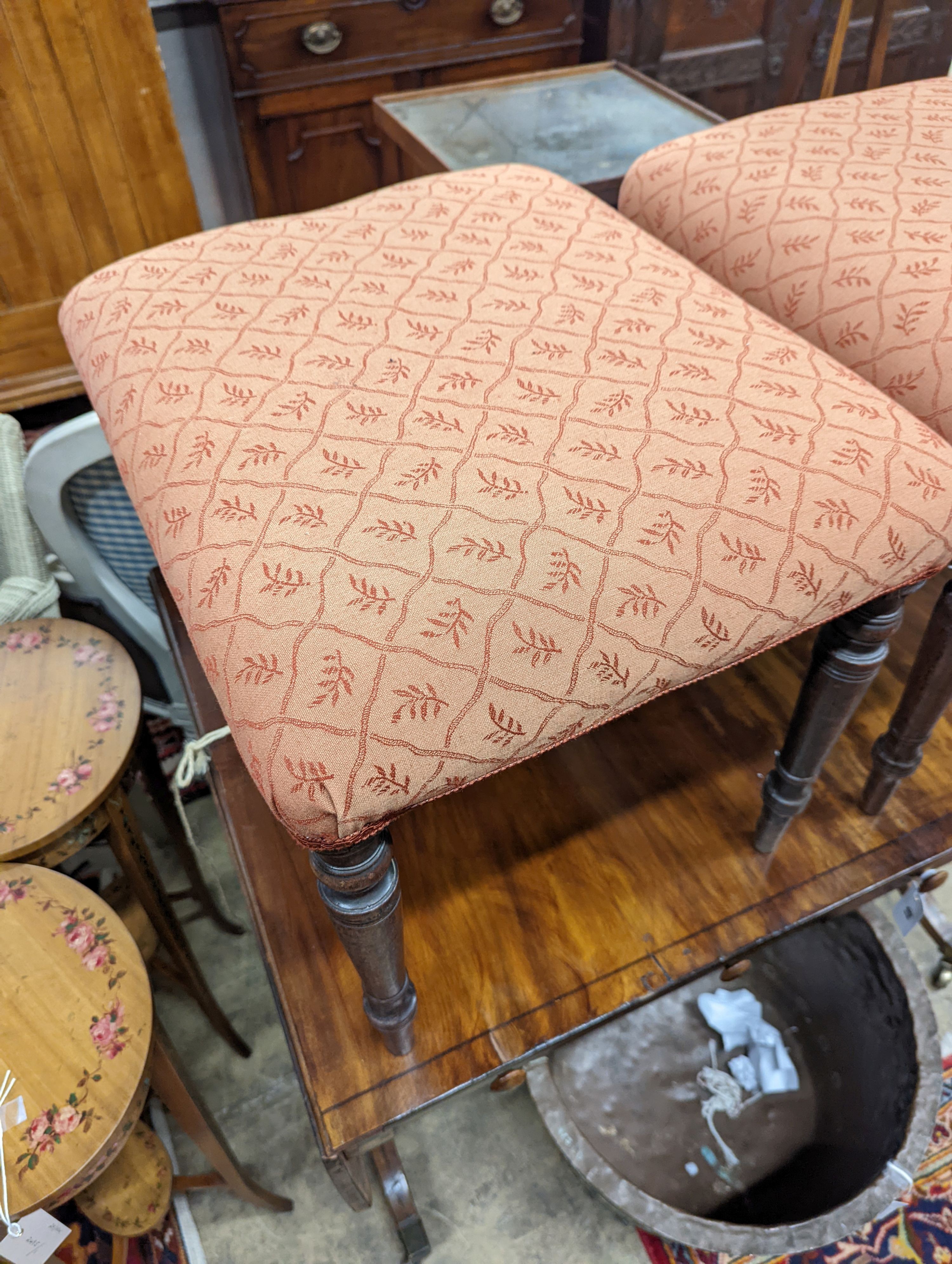 A pair of Regency rectanuglar mahogany upholstered dressing stools, length 50cm, depth 42cm, height 44cm